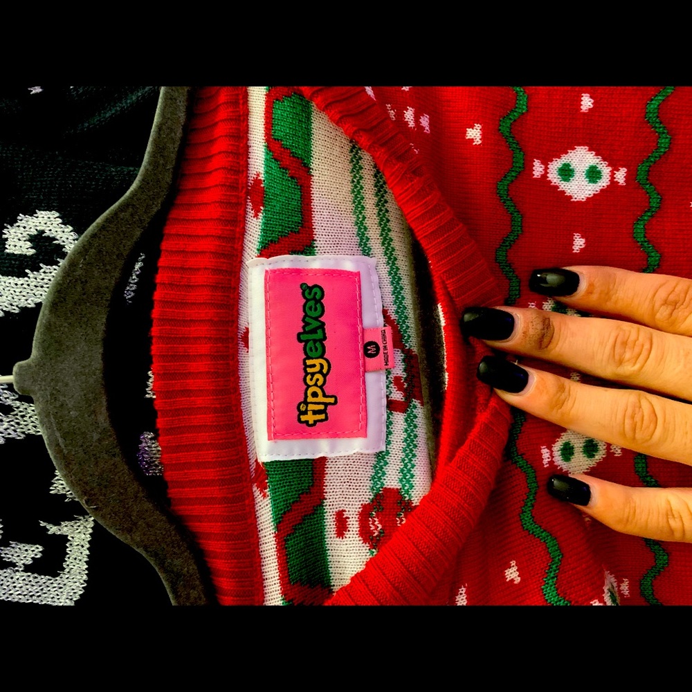 Tipsy elves holiday themed red Christmas sweater dress